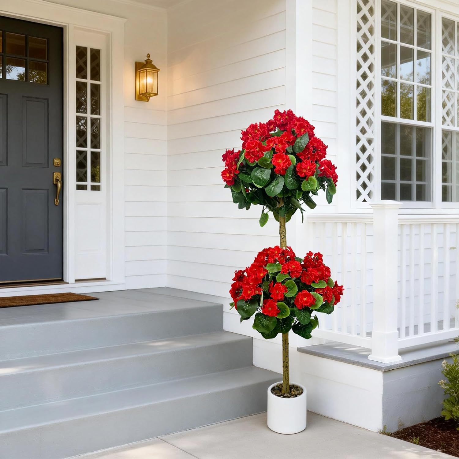 Planta de geranio artificial con flores rojas y diseño topiario de doble esfera en maceta blanca Garvee
